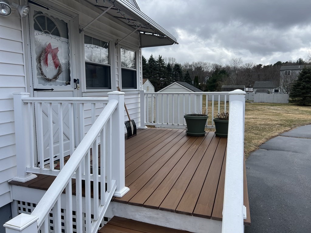39 Mill Road Chelmsford, MA 01824 - Photo 18 of 22 a view of balcony with furniture