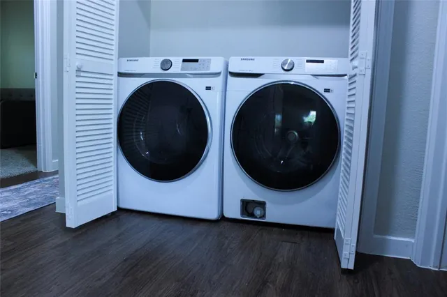 a utility room with dryer and washer