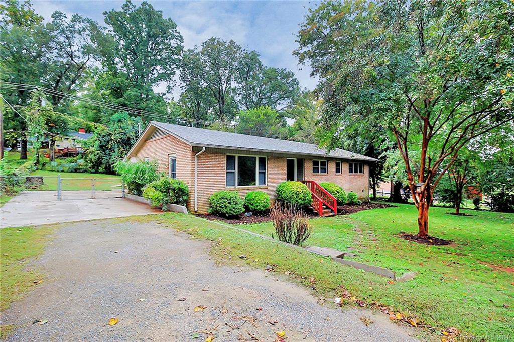 307 Harris Street Fort Mill, SC 29715 - Photo 2 of 39 a front view of house with yard and green space