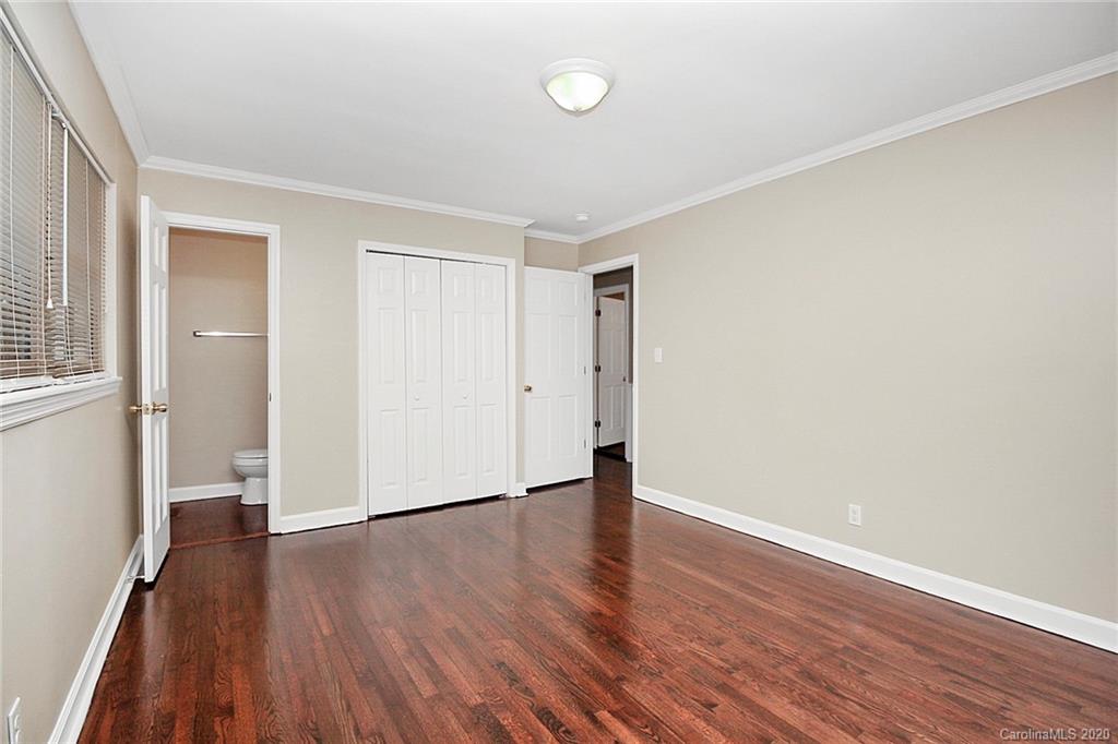 307 Harris Street Fort Mill, SC 29715 - Photo 21 of 39 a view of an empty room with wooden floor