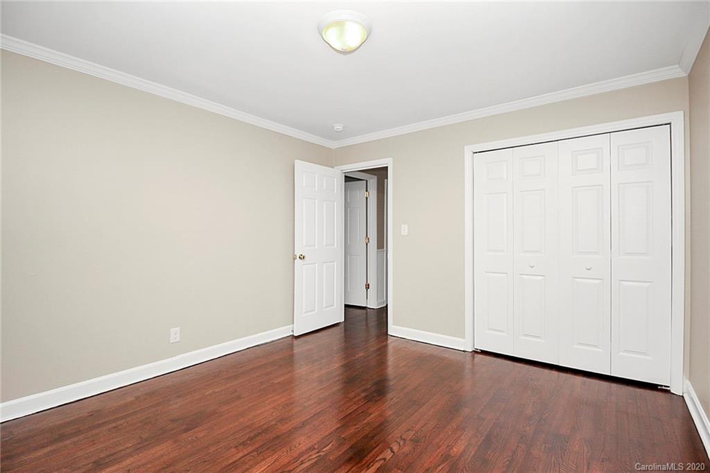 307 Harris Street Fort Mill, SC 29715 - Photo 25 of 39 a view of an empty room with wooden floor