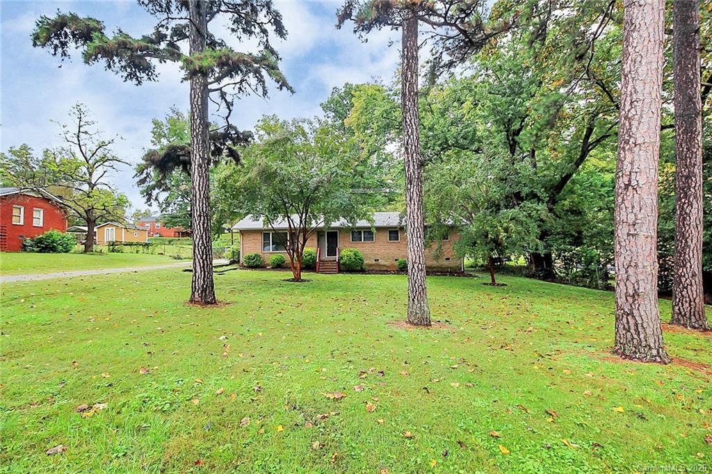 307 Harris Street Fort Mill, SC 29715 - Photo 38 of 39 a view of a trees with a yard