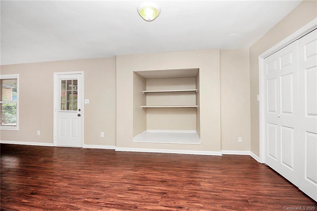 307 Harris Street Fort Mill, SC 29715 - Photo 7 of 39 a view of empty room with wooden floor and fan