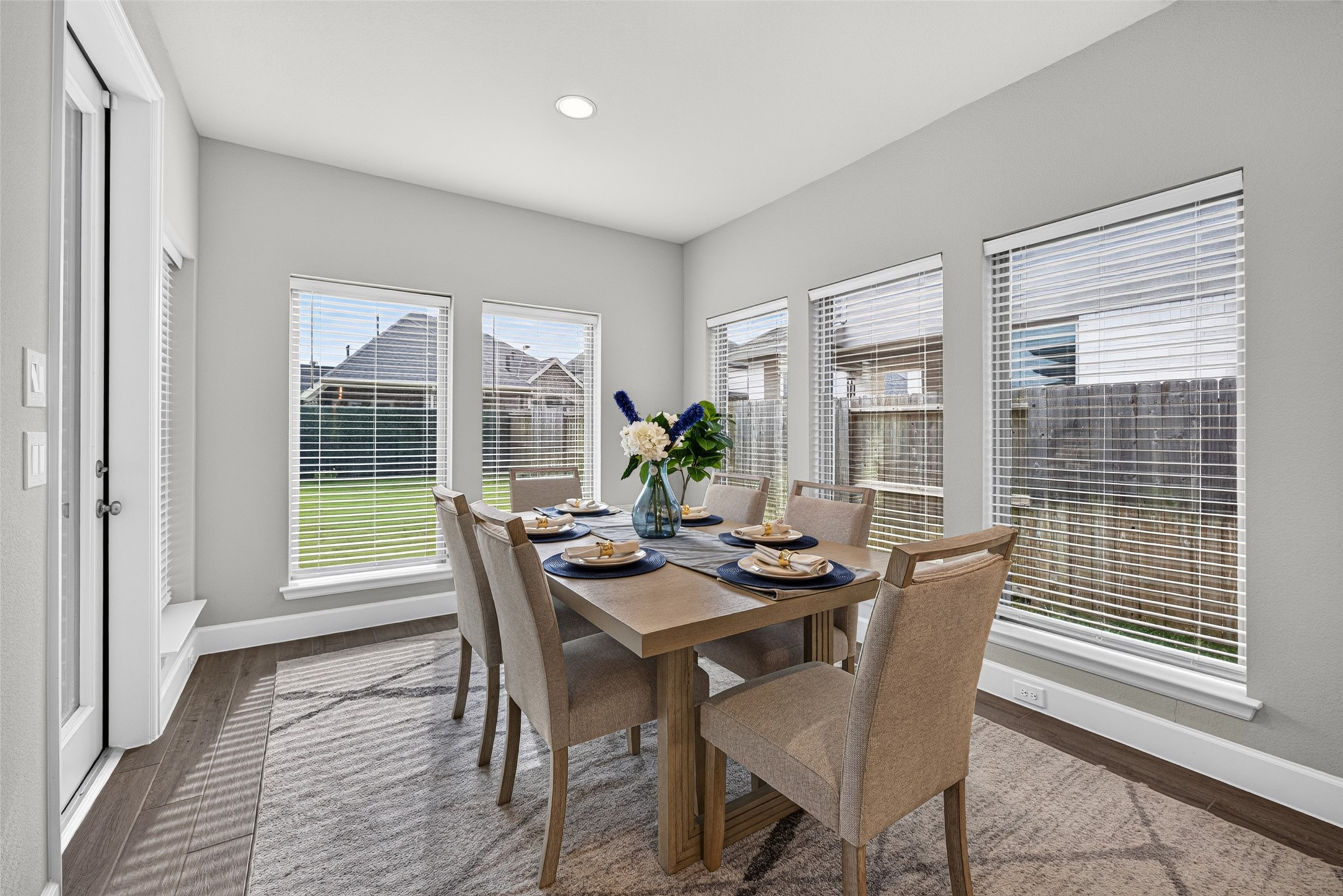 4207 Ana Ridge Lane Fulshear, TX 77441 - Photo 13 of 37 Bright, open dining space that seamlessly connects to the kitchen, ready for memorable holiday feasts, shared meals, and daily family chats.