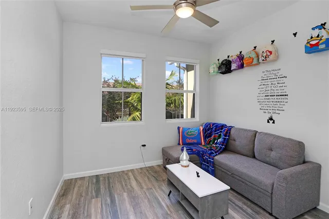 a living room with furniture and a window