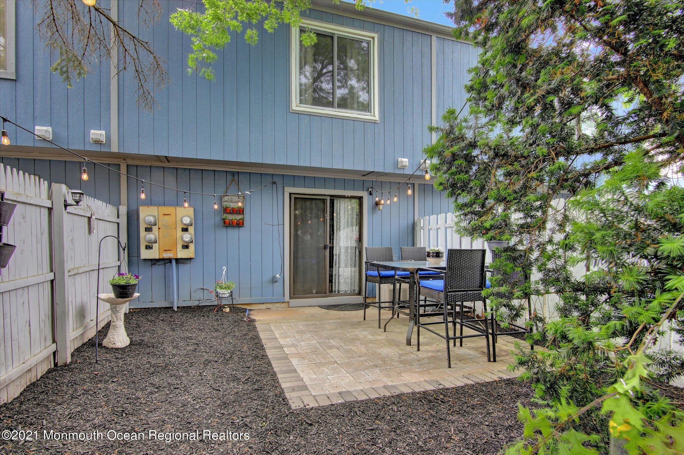 53 Creek Road, Unit 413 Brick, NJ 08724 - Photo 17 of 22 17-Back Patio & Yard
