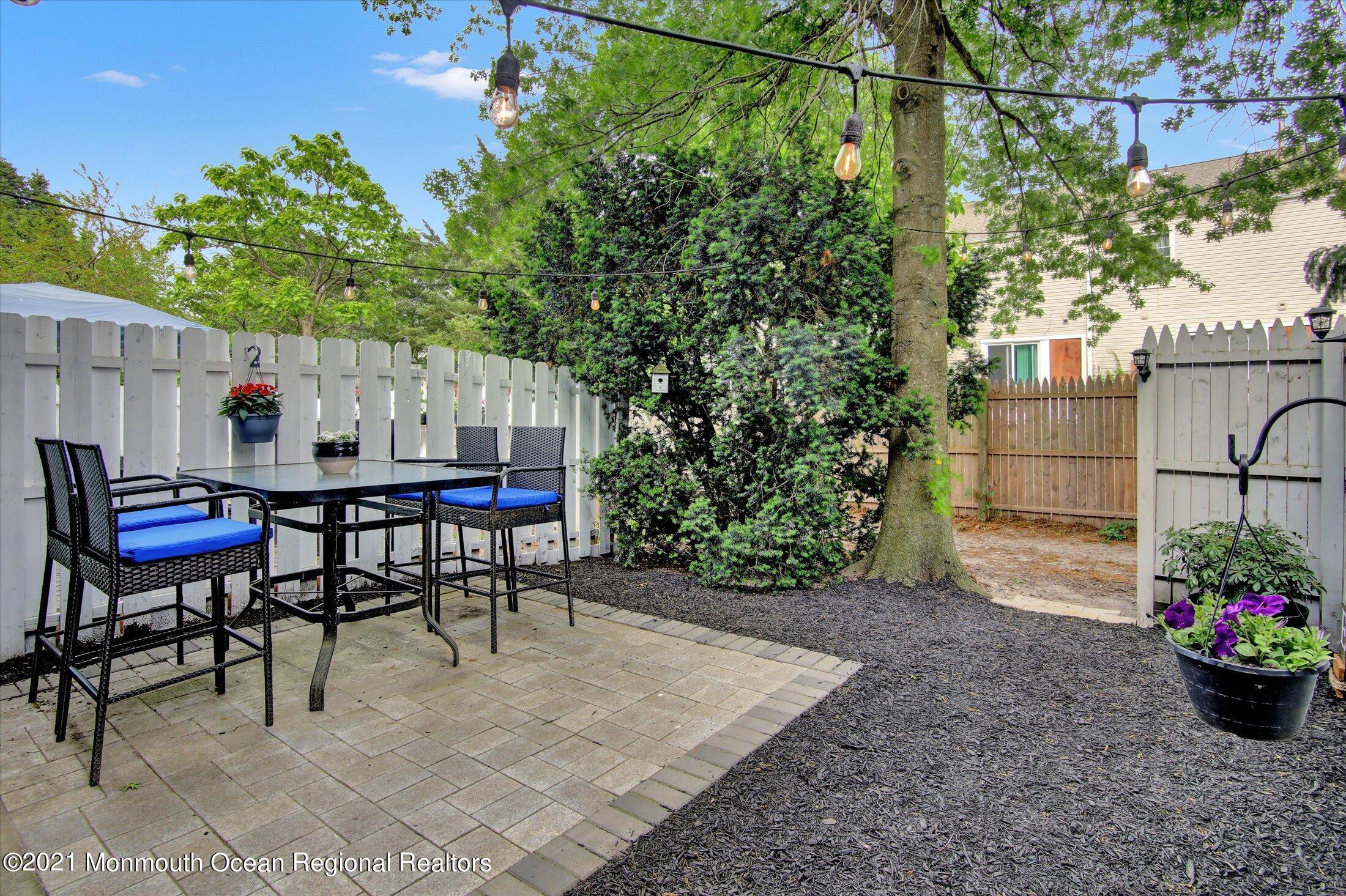 53 Creek Road, Unit 413 Brick, NJ 08724 - Photo 19 of 22 19-Back Patio & Yard