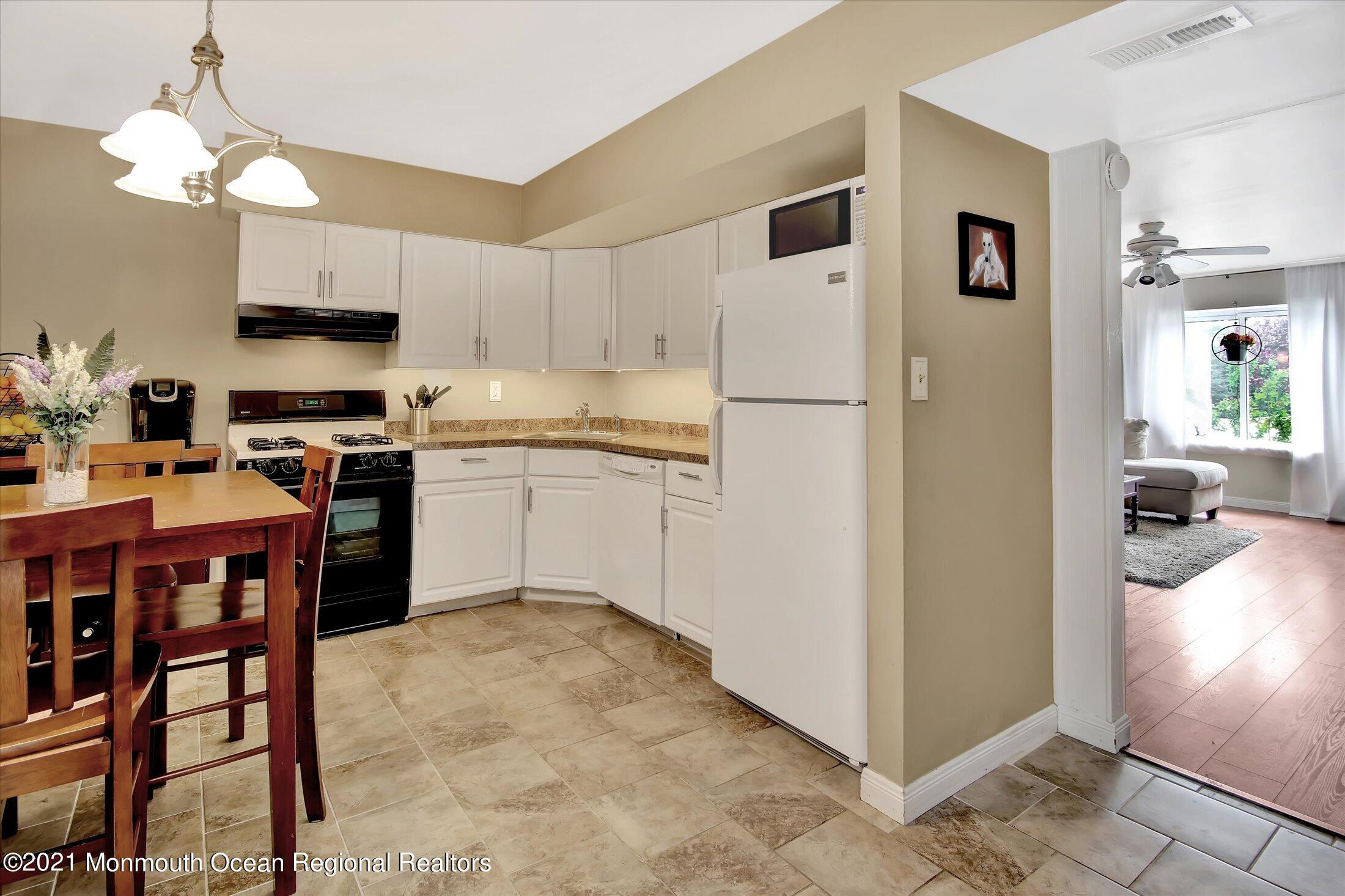 53 Creek Road, Unit 413 Brick, NJ 08724 - Photo 6 of 22 06-Kitchen to Living