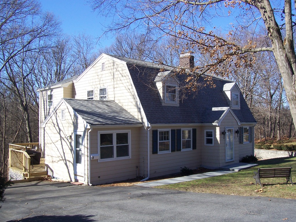 a front view of a house with a garage