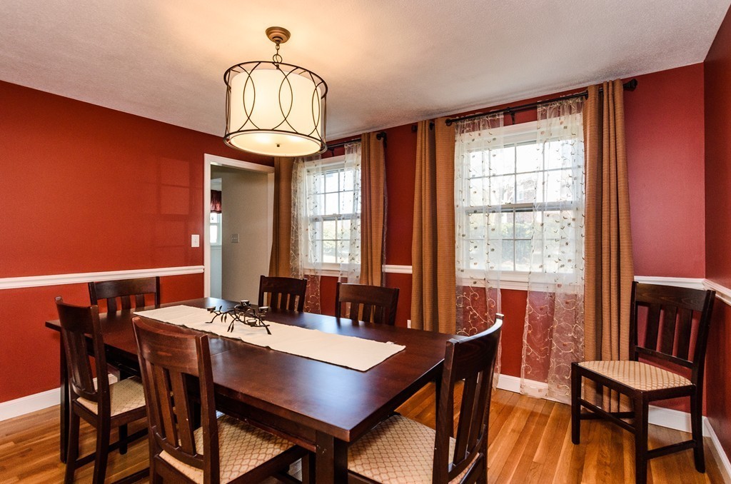8 Circle Road Lexington, MA 02420 - Photo 3 of 10 a view of a dining room with furniture window and wooden floor