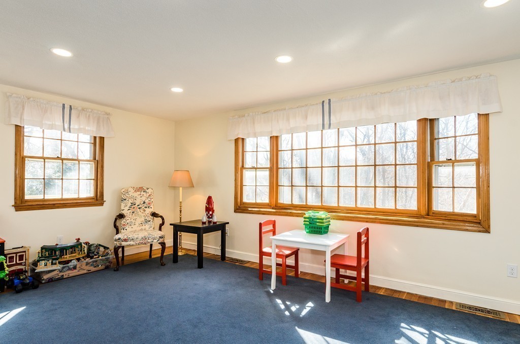 8 Circle Road Lexington, MA 02420 - Photo 6 of 10 a living room with furniture and a window