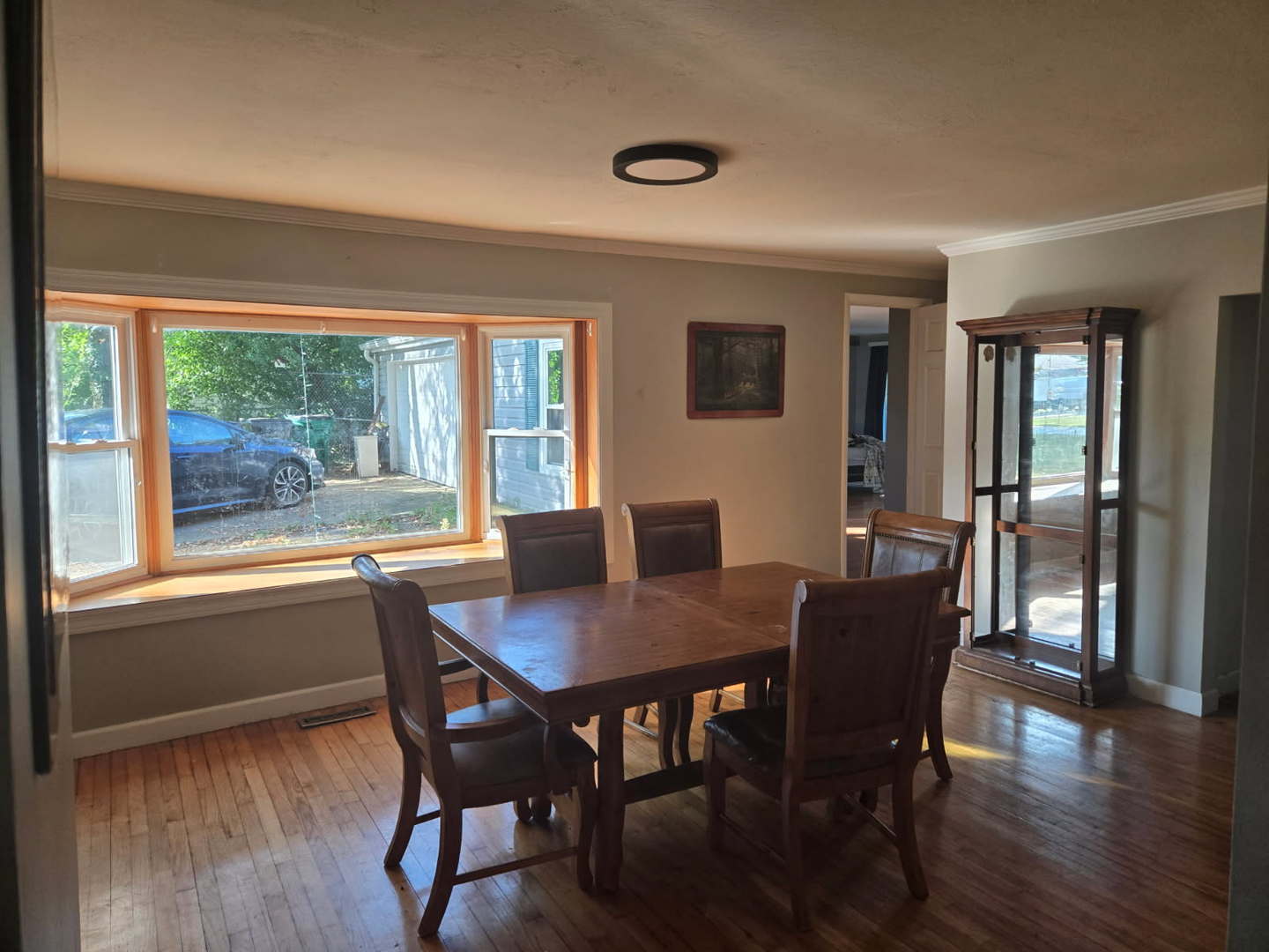 S732 Myrtle Street Winfield, IL 60190 - Photo 4 of 10 a view of a dining room with furniture window and wooden floor