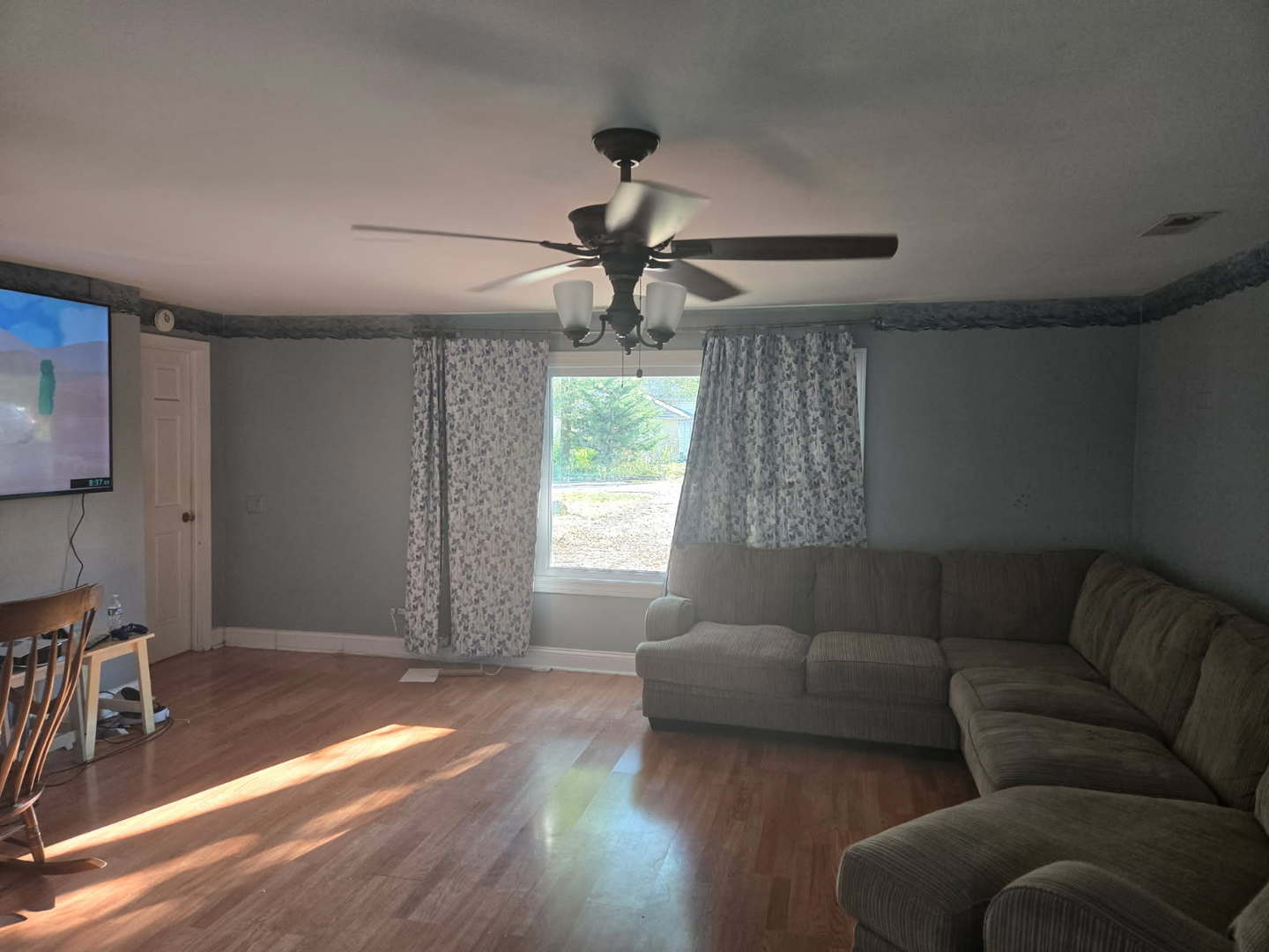S732 Myrtle Street Winfield, IL 60190 - Photo 6 of 10 a living room with furniture and a chandelier