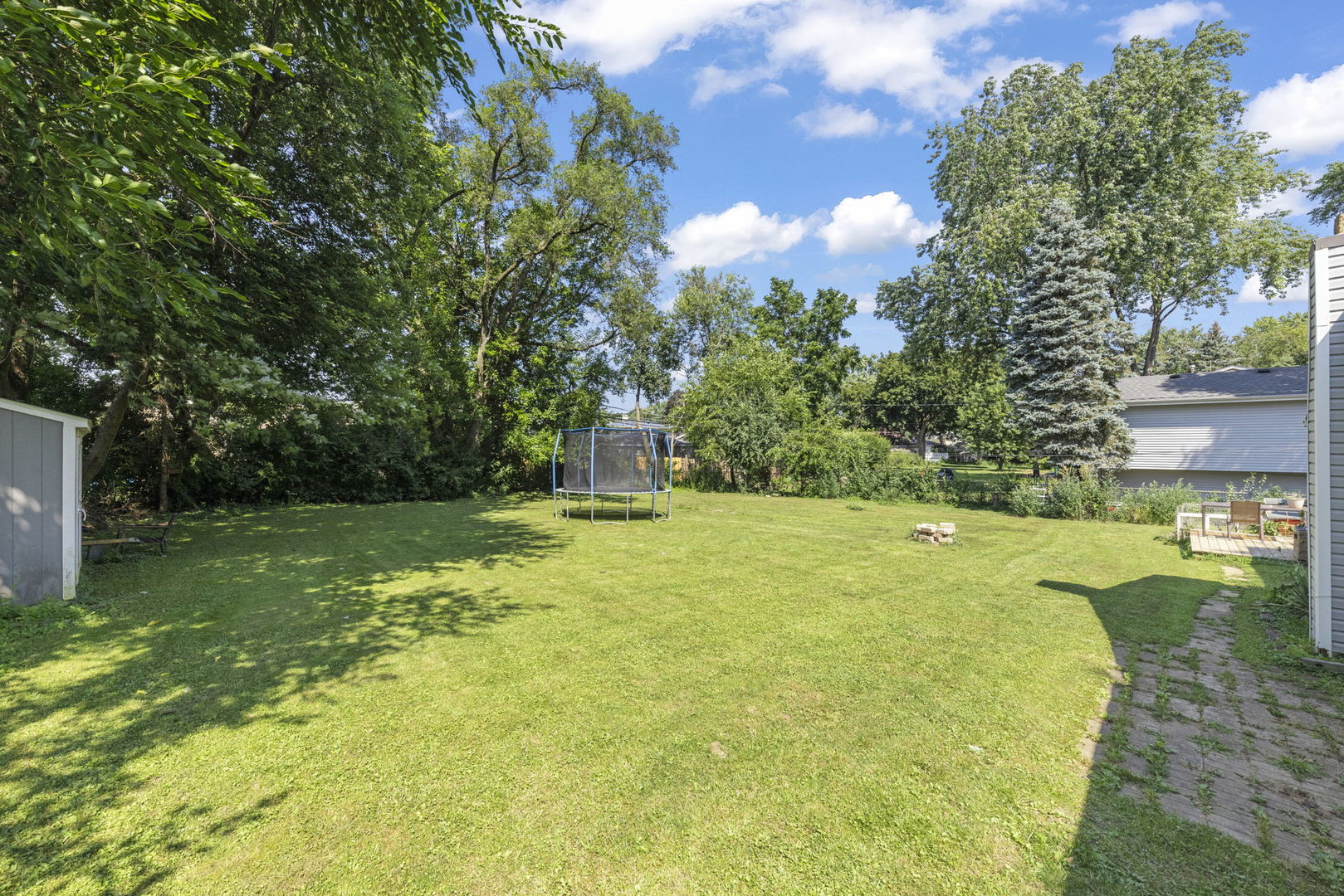 S732 Myrtle Street Winfield, IL 60190 - Photo 7 of 10 a view of a yard with swimming pool
