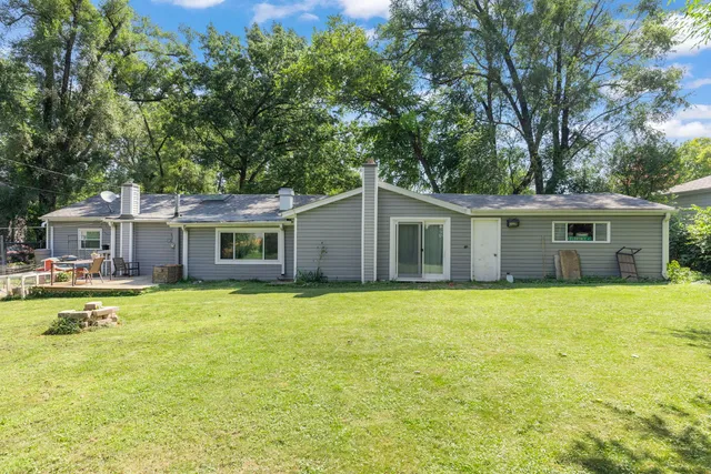 a view of a house with swimming pool