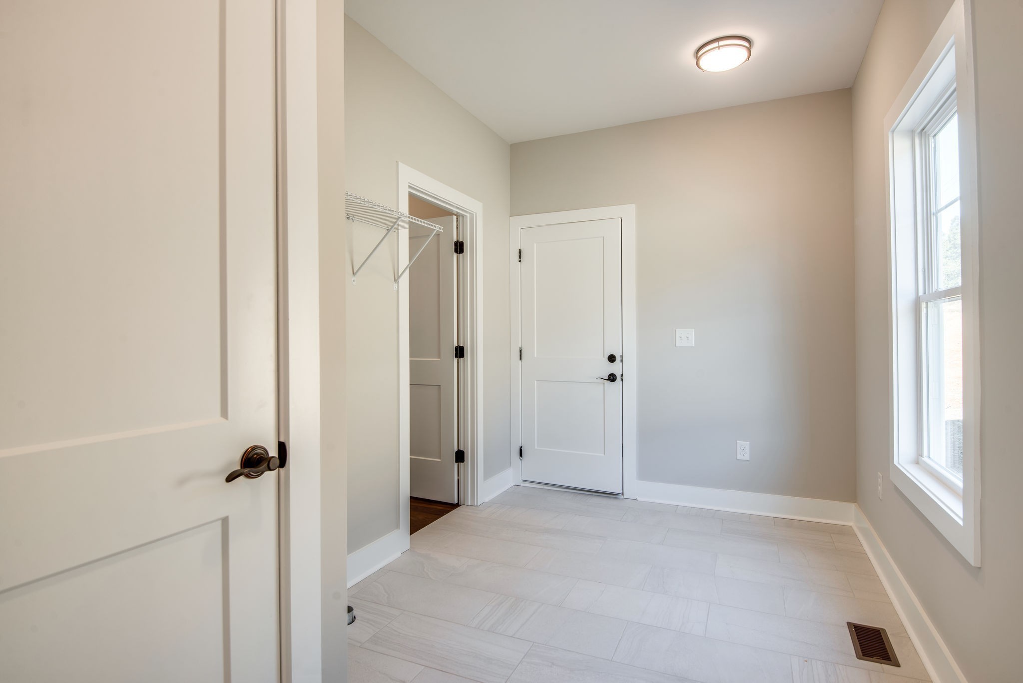 57 Sycamore Ridge Burns, TN 37029 - Photo 14 of 14 a view of a hallway with a glass door