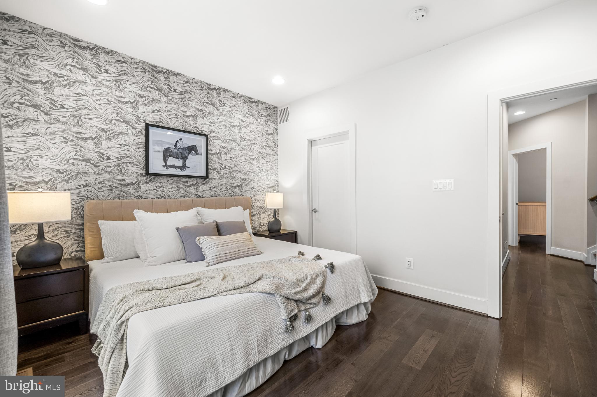 1600 Beason Street Baltimore, MD 21230 - Photo 28 of 53 a bed room with a bed and a painting