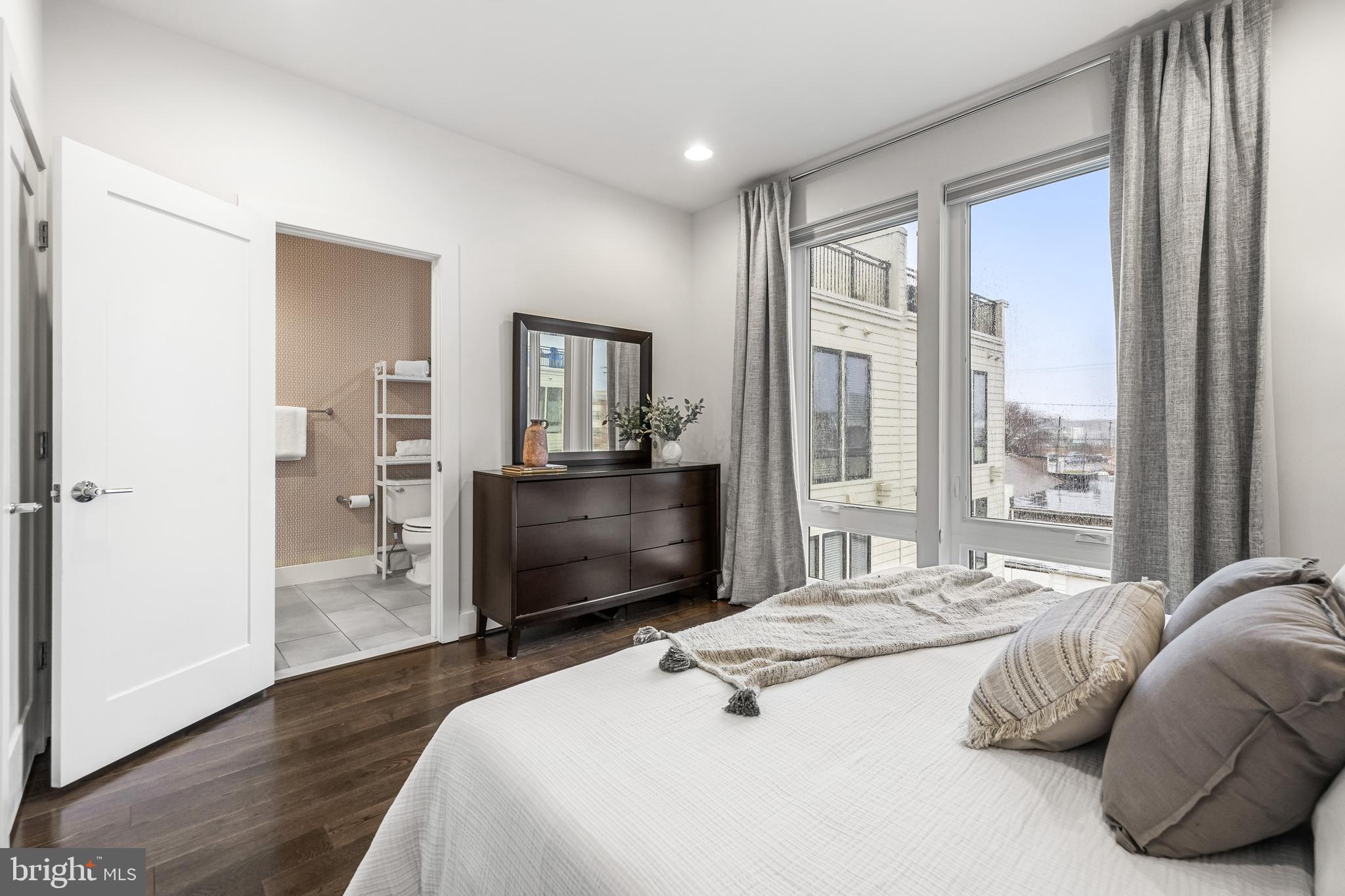 1600 Beason Street Baltimore, MD 21230 - Photo 29 of 53 a bedroom with a bed and a television