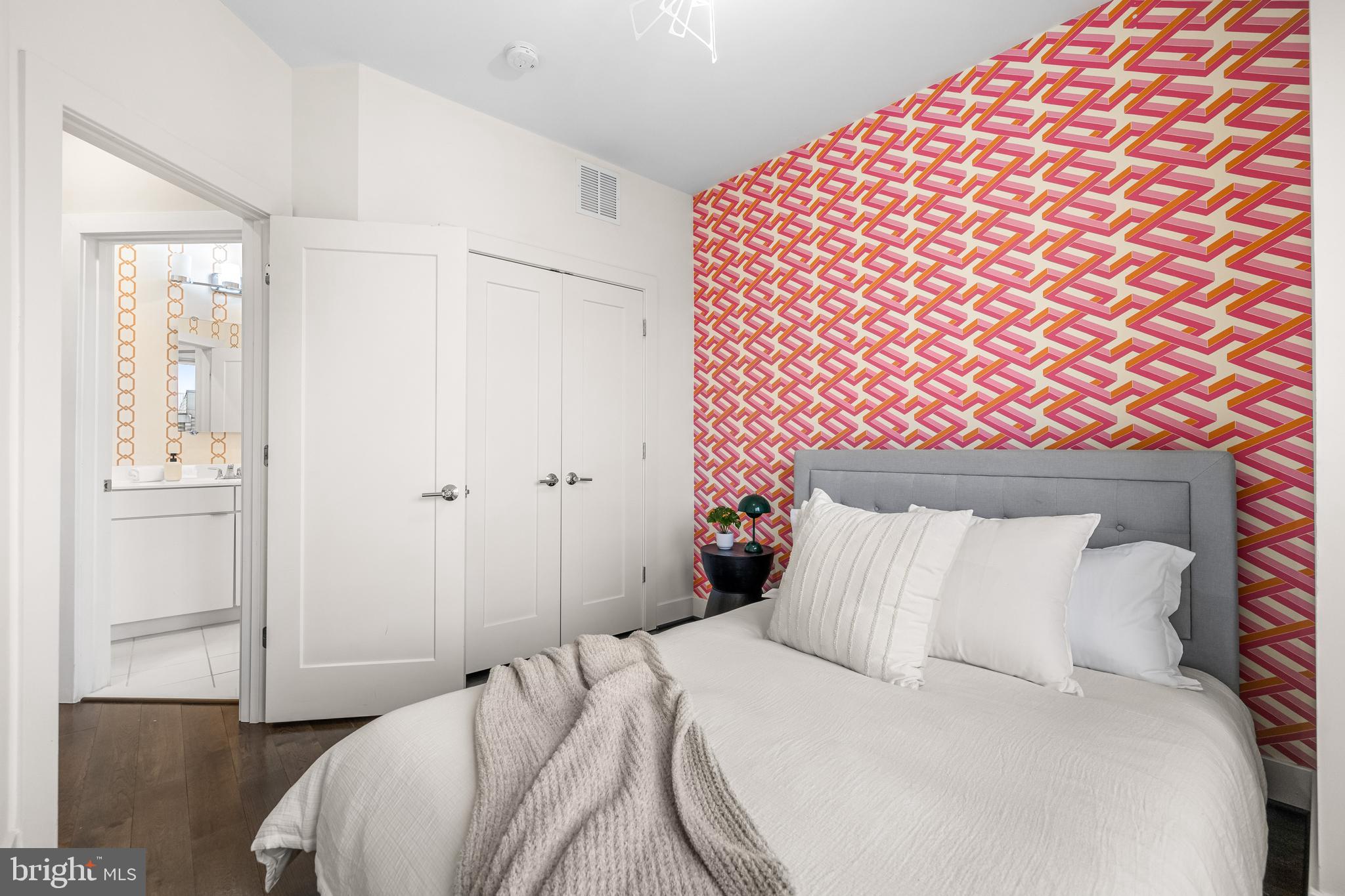 1600 Beason Street Baltimore, MD 21230 - Photo 34 of 53 a bedroom with a bed and painting on the wall