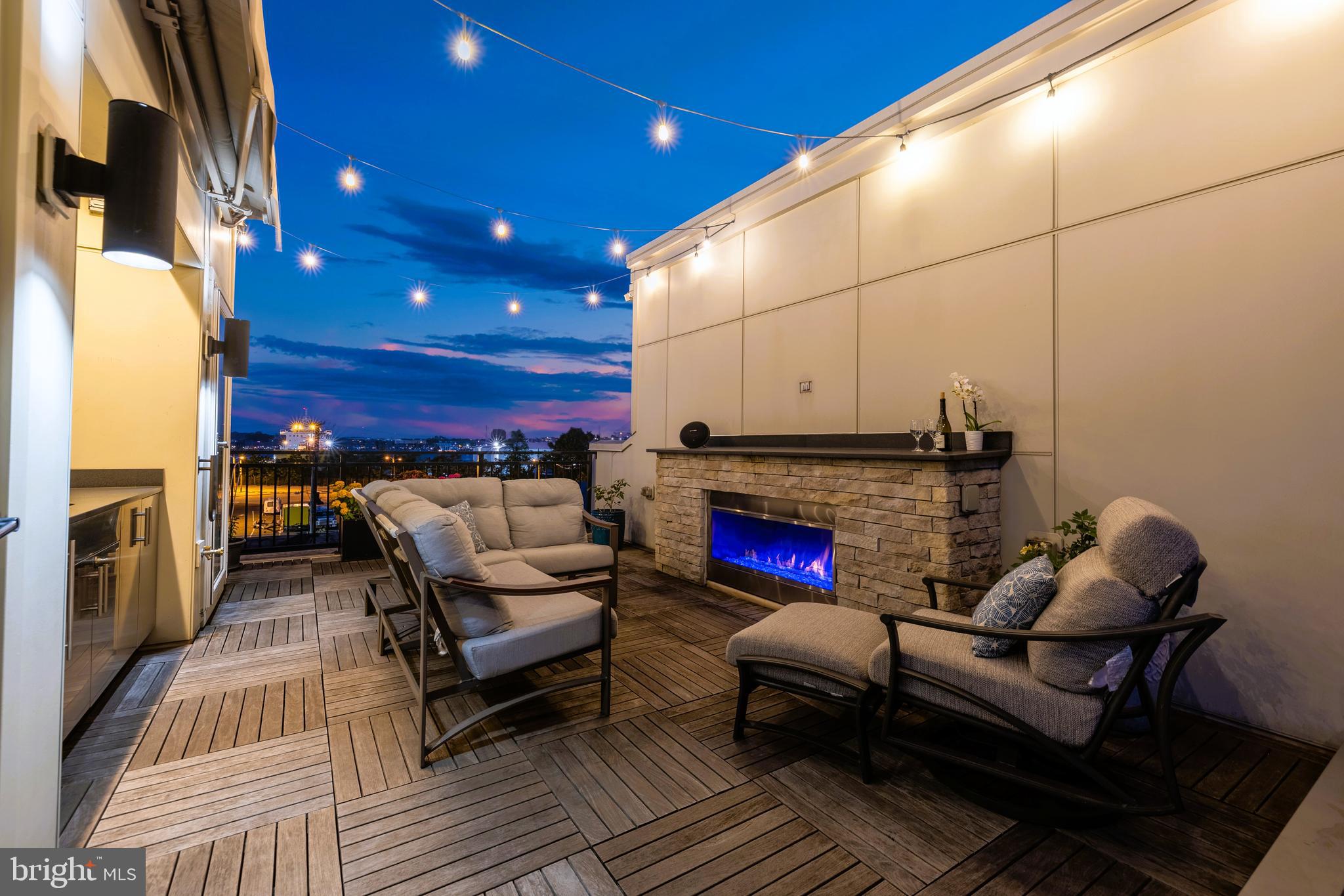 1600 Beason Street Baltimore, MD 21230 - Photo 43 of 53 a outdoor living space with patio furniture and a fireplace