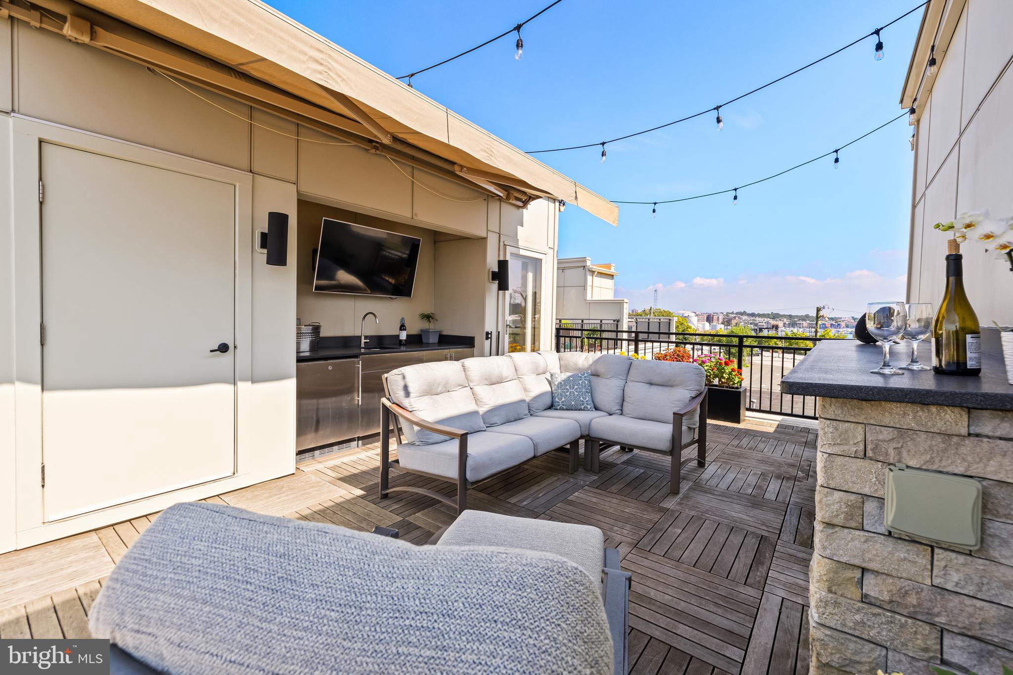 1600 Beason Street Baltimore, MD 21230 - Photo 46 of 53 a roof deck with a table and chairs