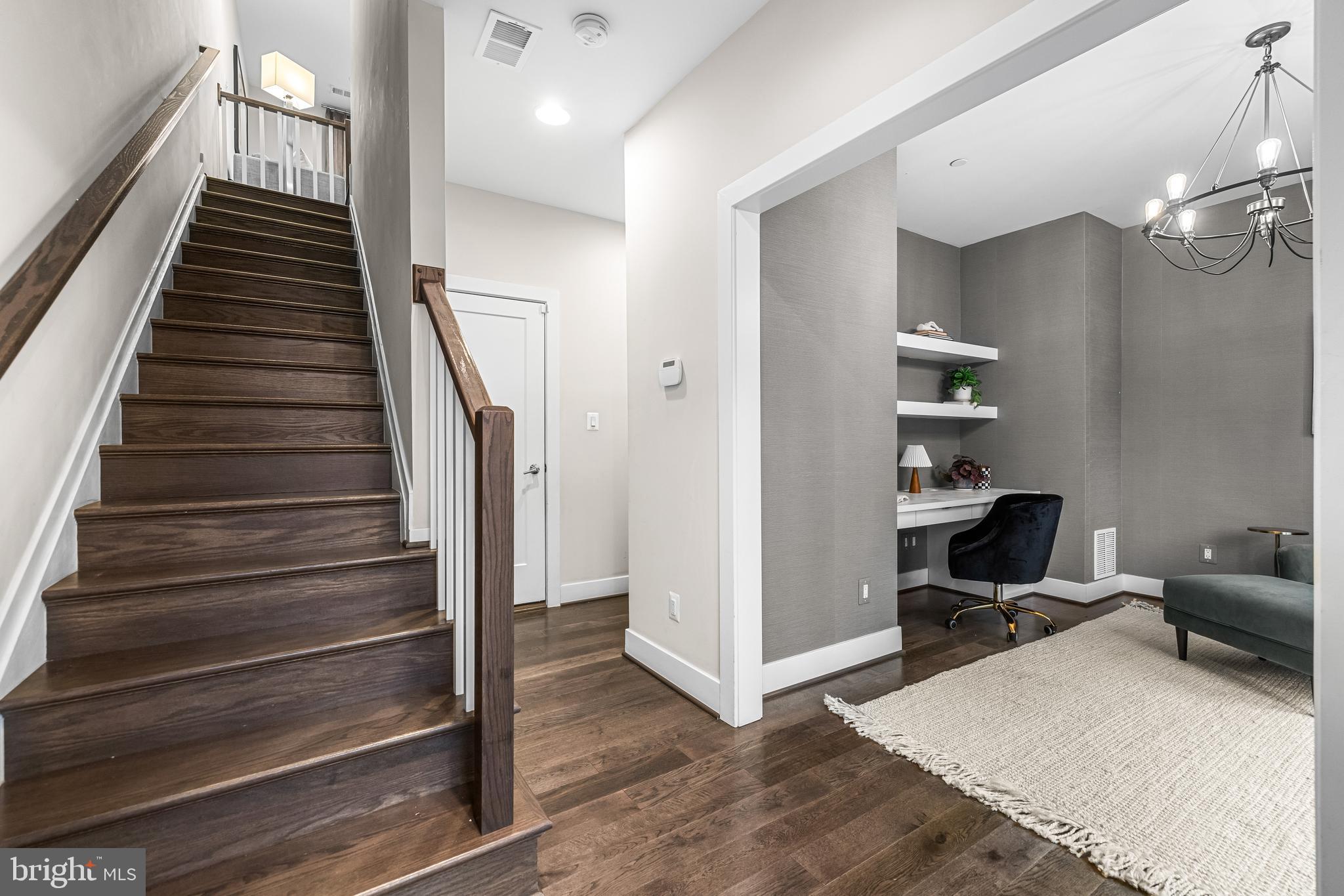 1600 Beason Street Baltimore, MD 21230 - Photo 8 of 53 a view of a hallway with workspace and wooden floor