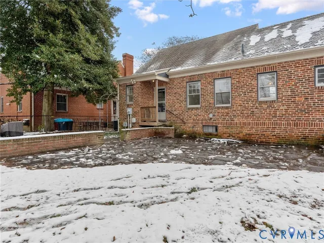 a view of street with large trees