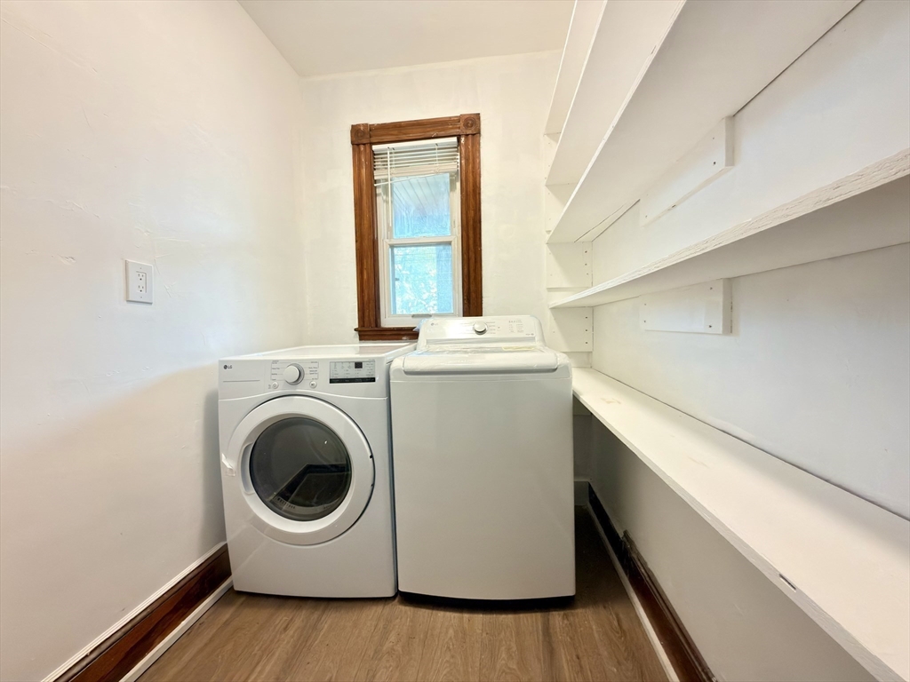 18 Harold Park, Unit 3 Boston, MA 02119 - Photo 40 of 41 a utility room with dryer and washer