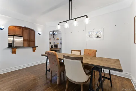 a living room with furniture a rug and a window