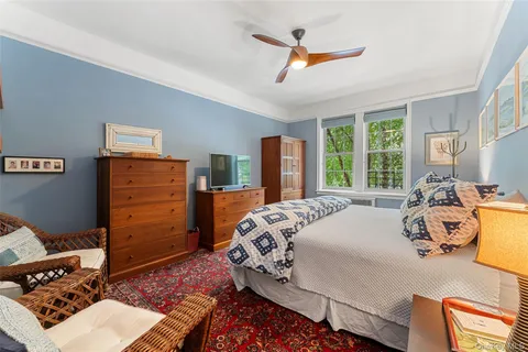 a kitchen with granite countertop cabinets stainless steel appliances a sink and a large window