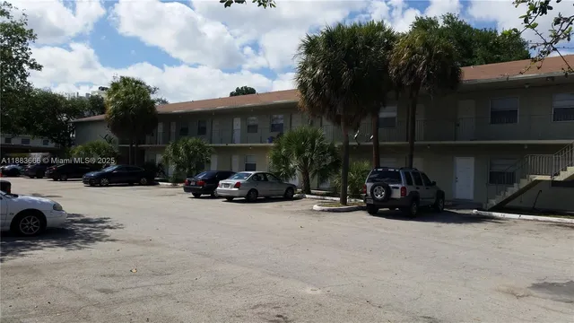 a view of street with parked cars