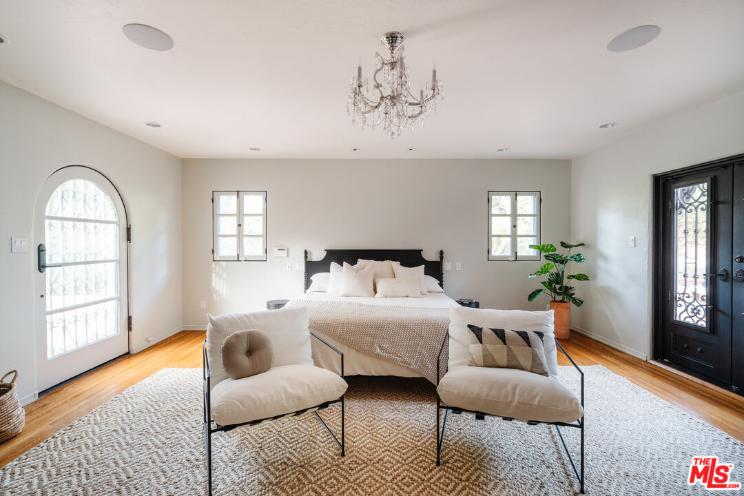 3131 Floye Drive Los Angeles, CA 90046 - Photo 17 of 53 a bedroom with furniture and a window