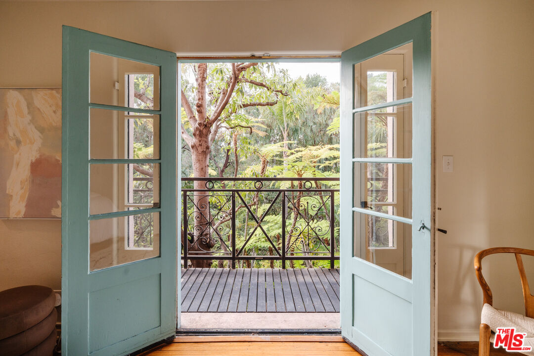 3131 Floye Drive Los Angeles, CA 90046 - Photo 23 of 53 a view of wooden floor and a window