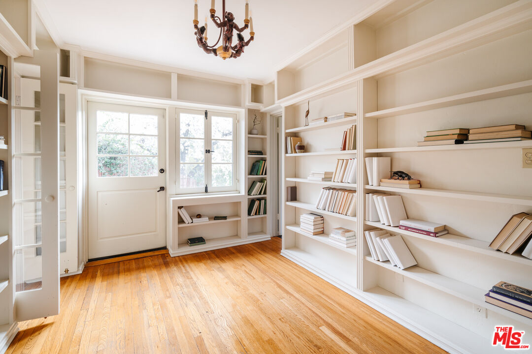 3131 Floye Drive Los Angeles, CA 90046 - Photo 25 of 53 a view of a bedroom with furniture and windows