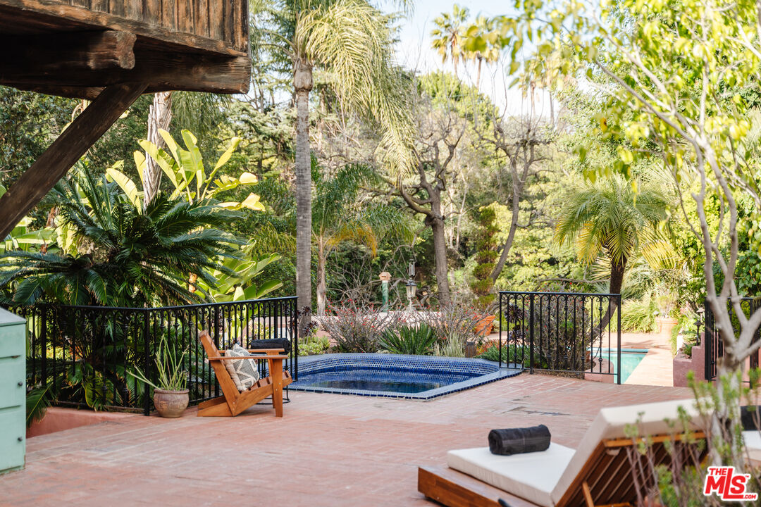 3131 Floye Drive Los Angeles, CA 90046 - Photo 3 of 53 a view of backyard with swimming pool and sitting area