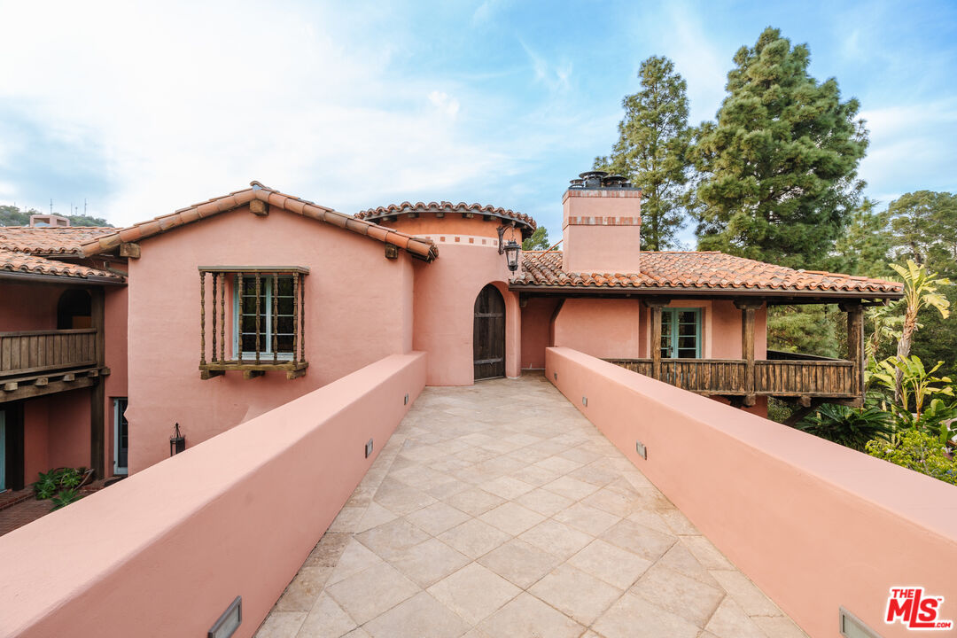 3131 Floye Drive Los Angeles, CA 90046 - Photo 5 of 53 a front view of a house with a yard