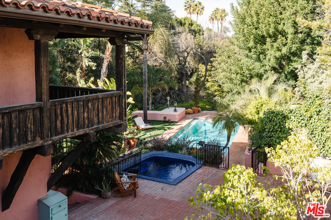 3131 Floye Drive Los Angeles, CA 90046 - Photo 6 of 53 a view of a deck and a yard