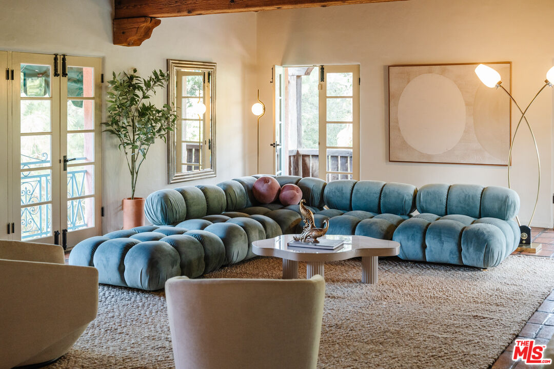3131 Floye Drive Los Angeles, CA 90046 - Photo 7 of 53 a living room with furniture and a large window