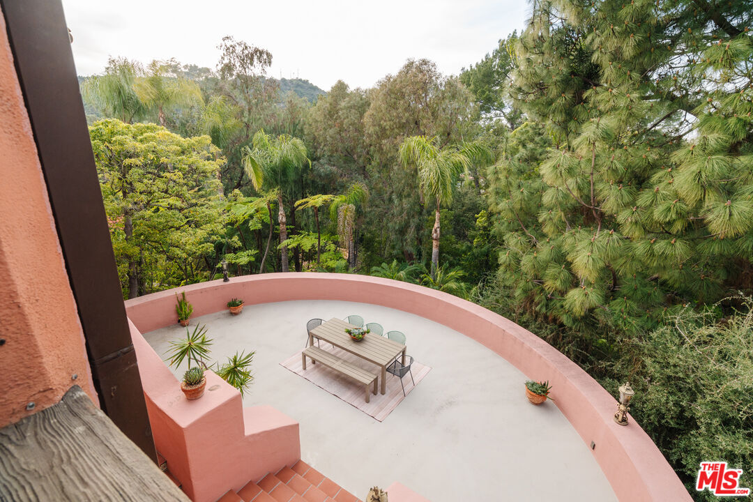 3131 Floye Drive Los Angeles, CA 90046 - Photo 10 of 53 a view of a swimming pool with a patio