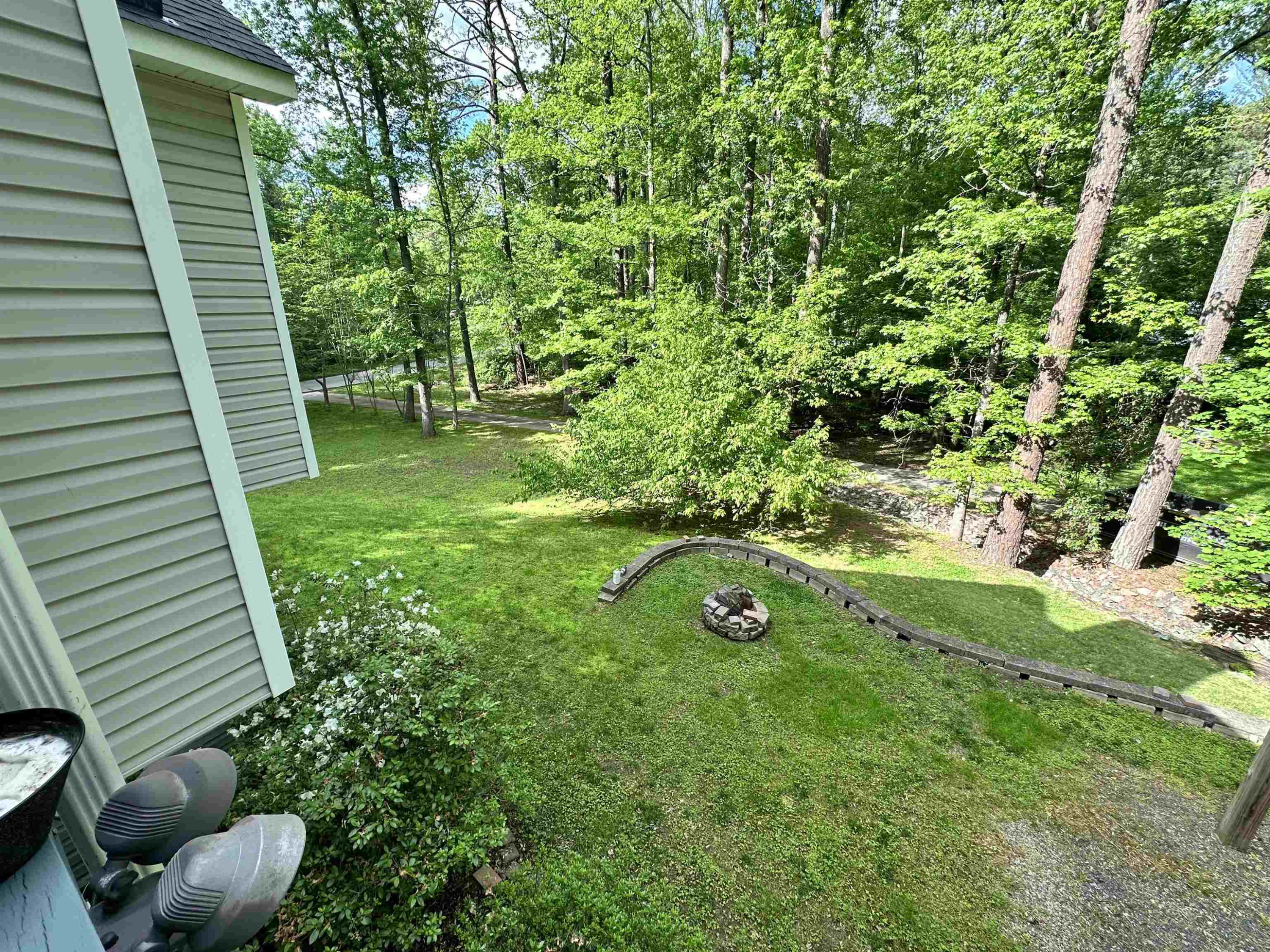 3801 Woodowl Drive Raleigh, NC 27613 - Photo 12 of 13 a view of an outdoor space with a garden