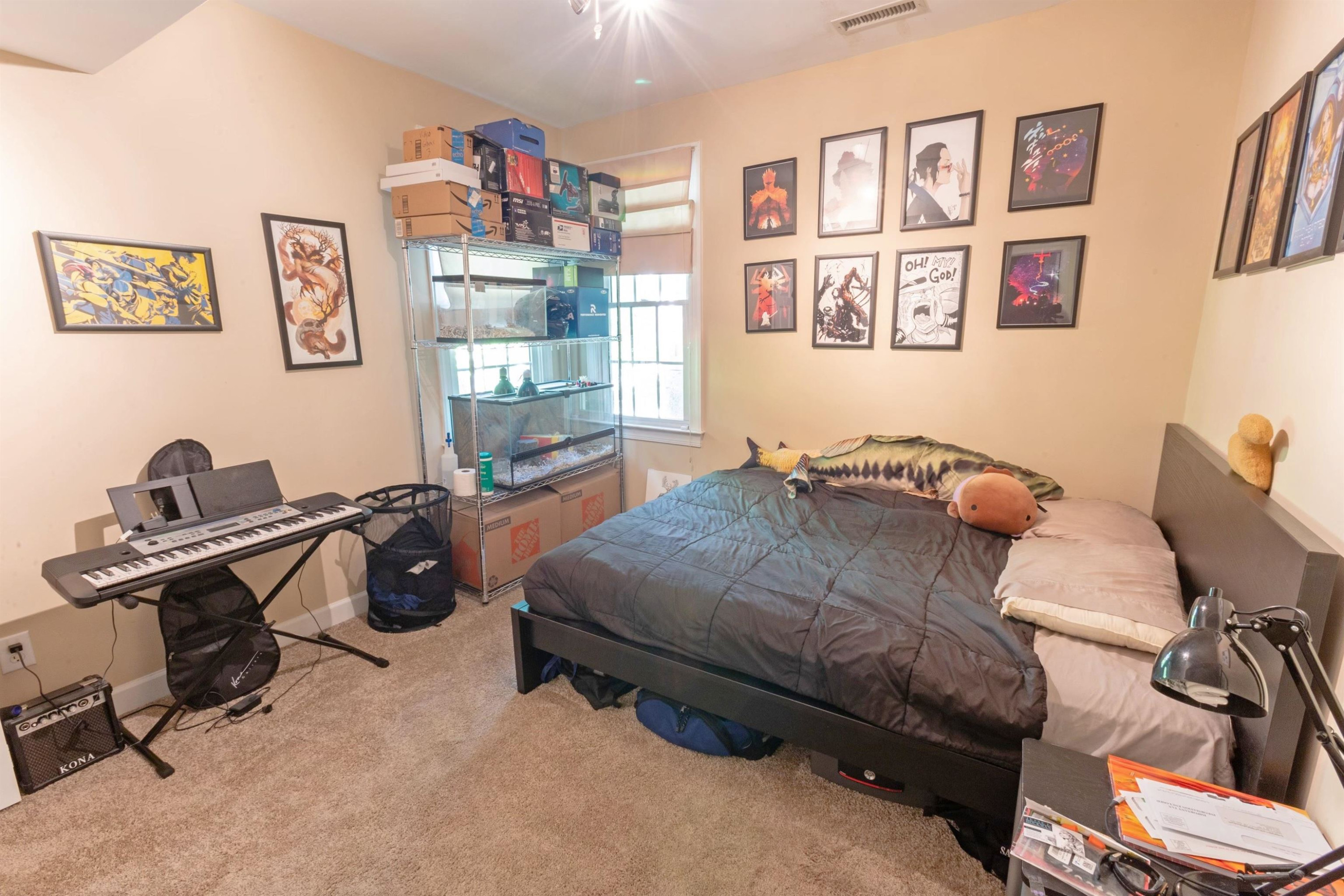 3801 Woodowl Drive Raleigh, NC 27613 - Photo 9 of 13 a bedroom with bed and a desk