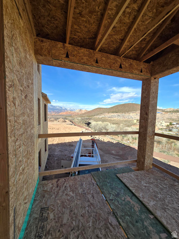 324 North Rhyolite Drive, Unit 87 Hurricane, UT 84737 - Photo 27 of 33 View of yard featuring a mountain view