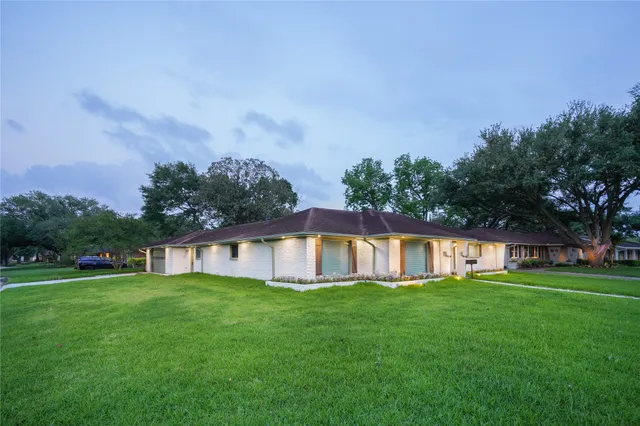 a view of a house with a big yard
