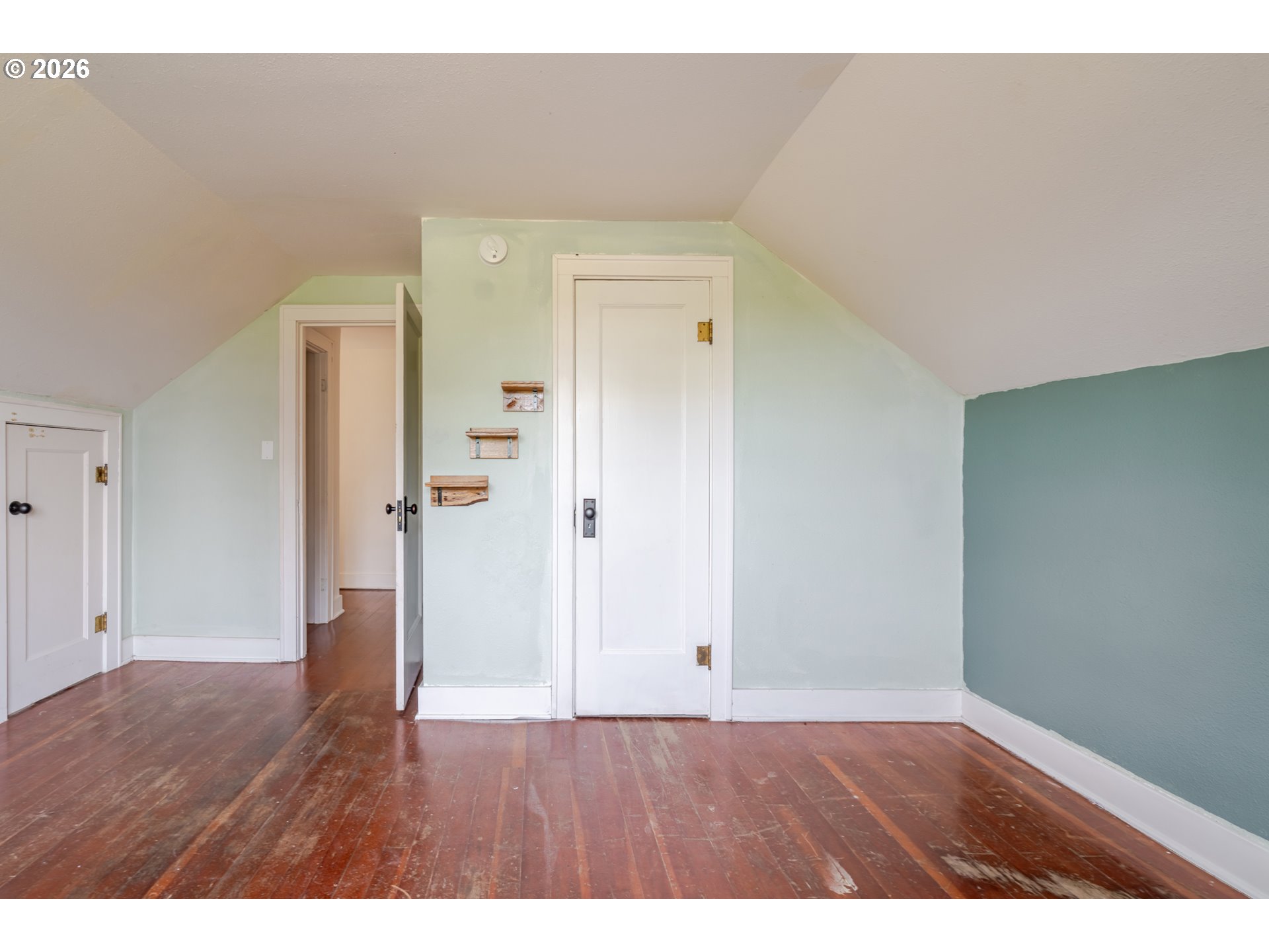 34965 Brewster Road Lebanon, OR 97355 - Photo 25 of 48 a view of an empty room with wooden floor