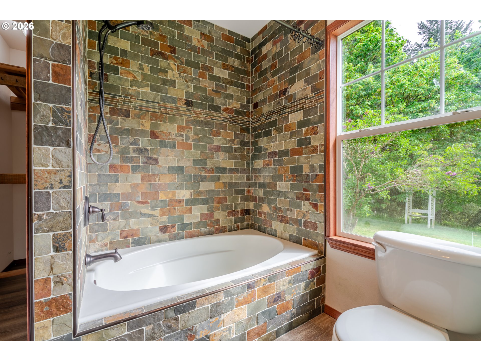 34965 Brewster Road Lebanon, OR 97355 - Photo 29 of 48 a bathroom with a bathtub and shower