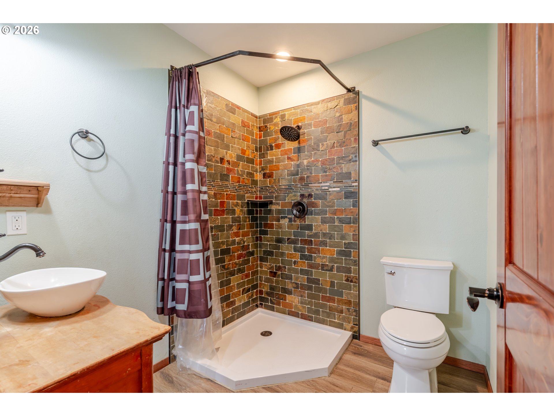 34965 Brewster Road Lebanon, OR 97355 - Photo 31 of 48 a bathroom with a toilet and a shower