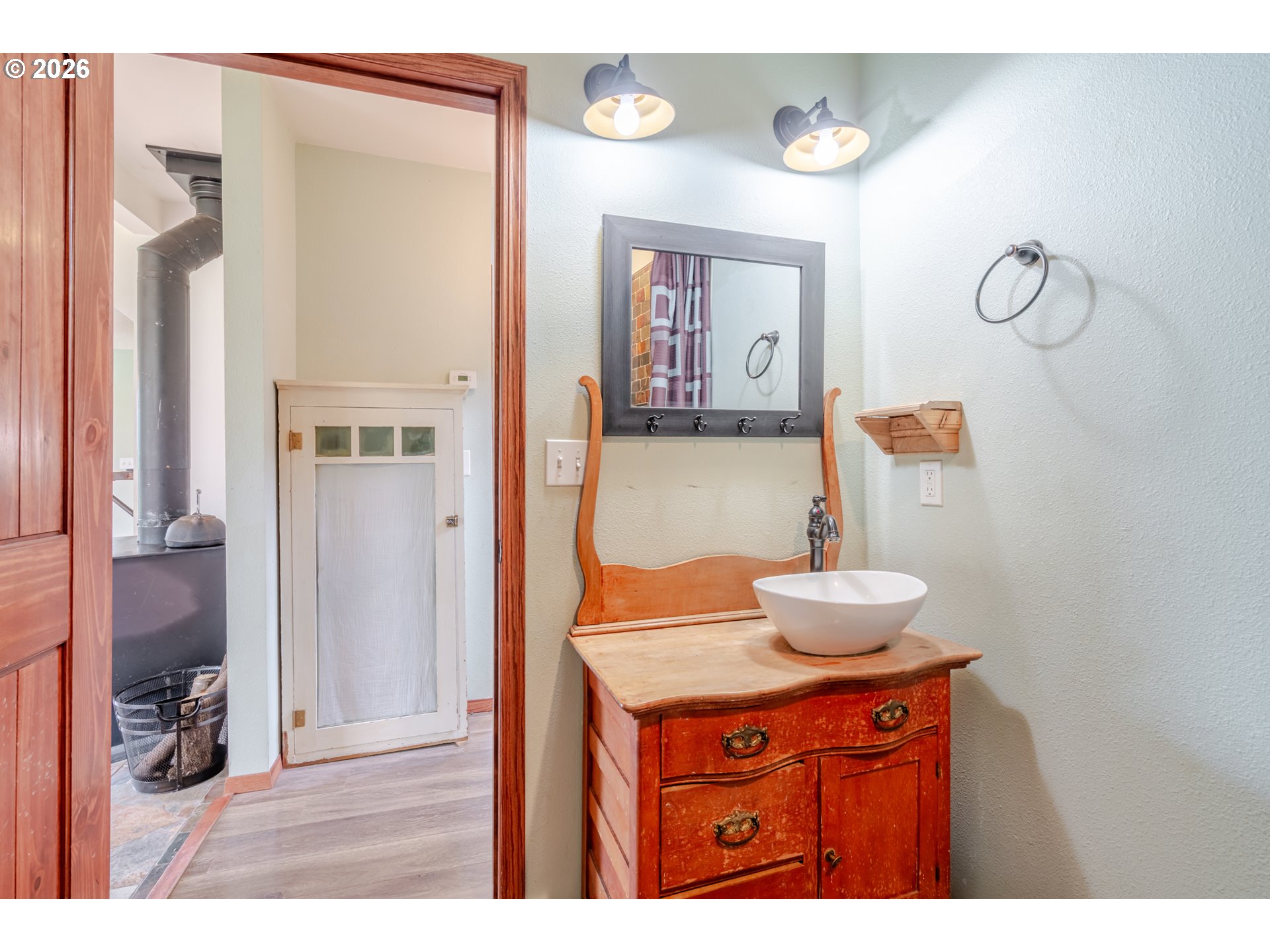 34965 Brewster Road Lebanon, OR 97355 - Photo 34 of 48 a room with a sink and a mirror