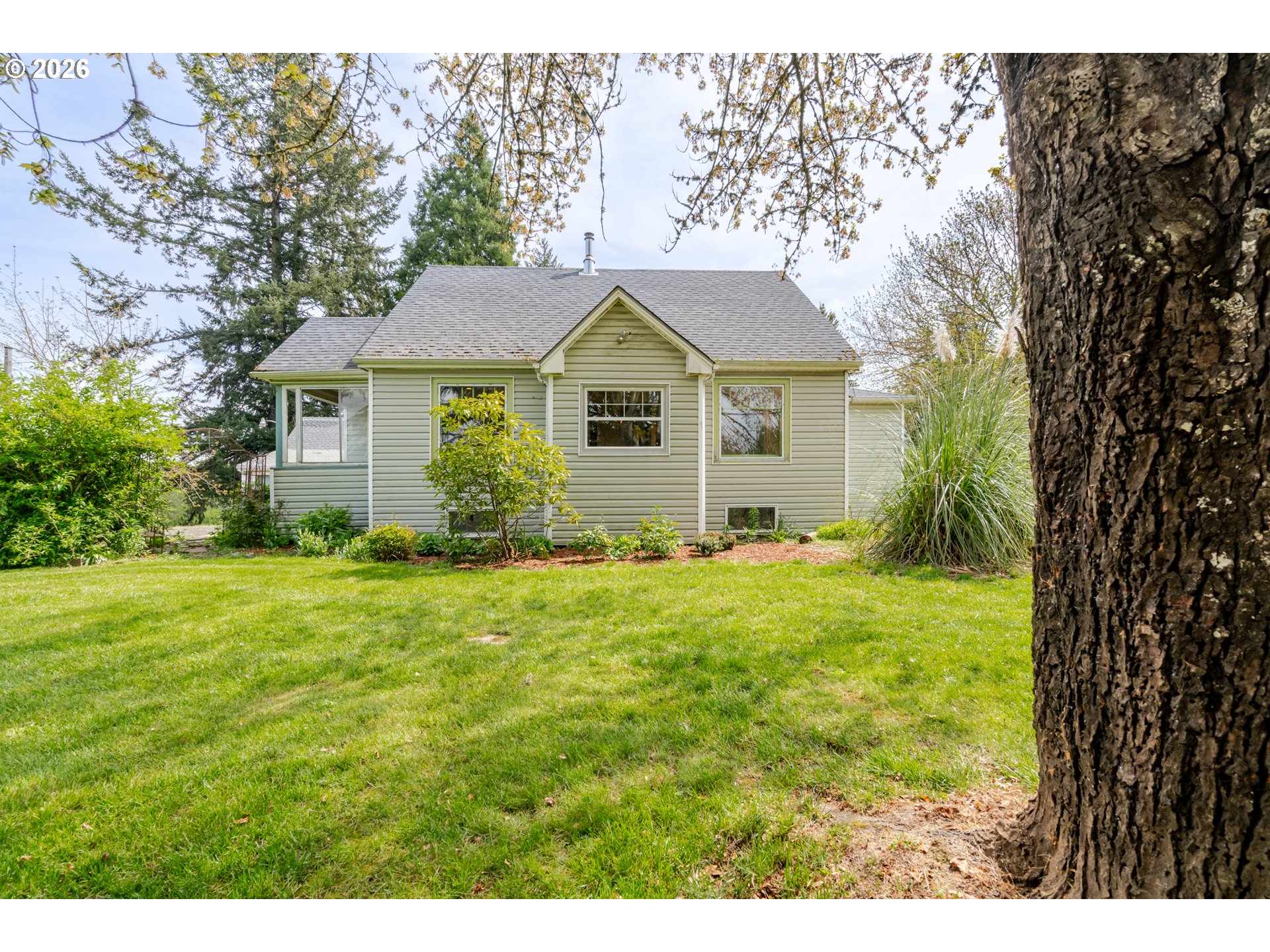 34965 Brewster Road Lebanon, OR 97355 - Photo 47 of 48 a house view with a garden space