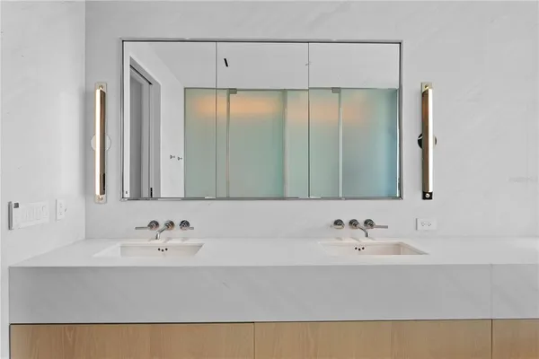 a white bath tub sitting in a bathroom