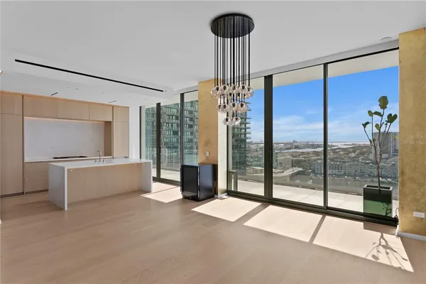 a view of an empty room and window